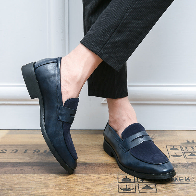 Men's penny loafers with a rounded toe, vamp strap and low heel