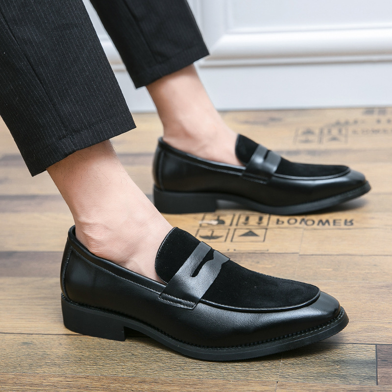 Men's penny loafers with a rounded toe, vamp strap and low heel