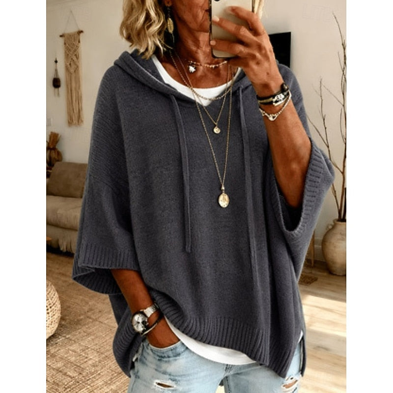 Women's hooded knit sweater with drawstring and side splits