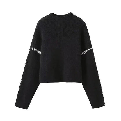 Women's crew neck knit sweater with contrast stitch detailing and long sleeves