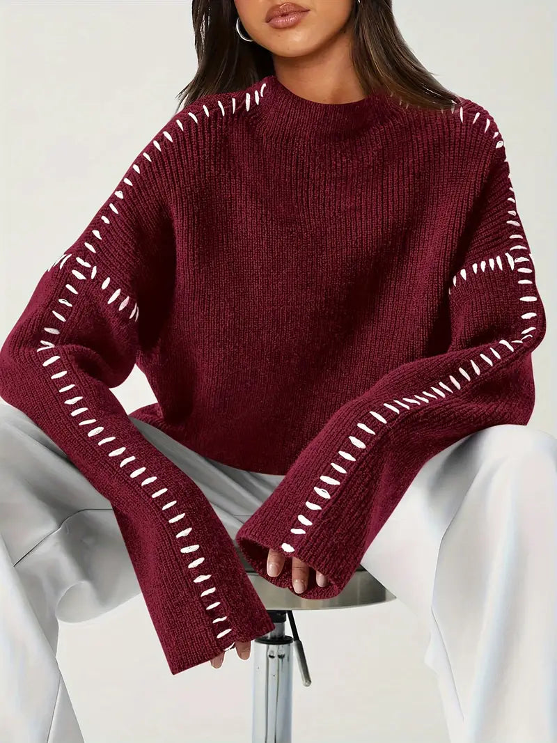 Women's crew neck knit sweater with contrast stitch detailing and long sleeves