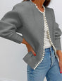 Women's open-front cardigan with pearl trim and long sleeves