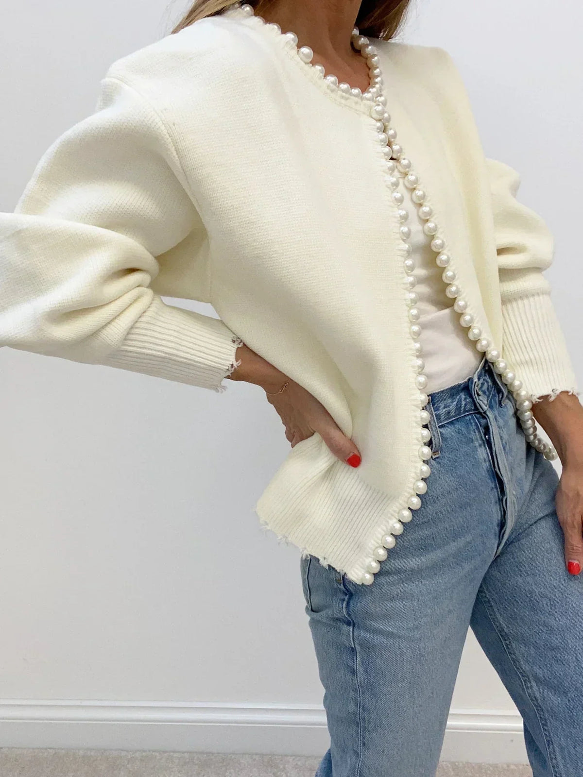 Women's open-front cardigan with pearl trim and long sleeves