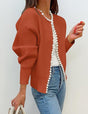 Women's open-front cardigan with pearl trim and long sleeves