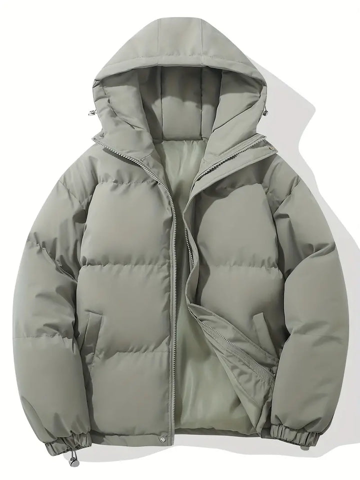 Women's hooded quilted winter jacket with zip front and adjustable hem