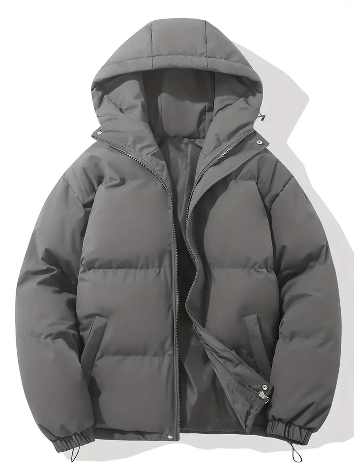 Women's hooded quilted winter jacket with zip front and adjustable hem