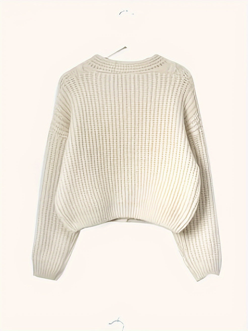 Women's beige chunky knit cardigan with cable panels and button front