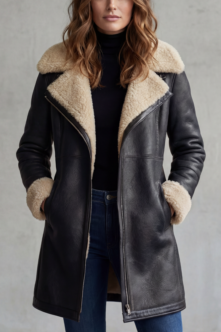 Women's black long coat with cream shearling-style collar and cuffs