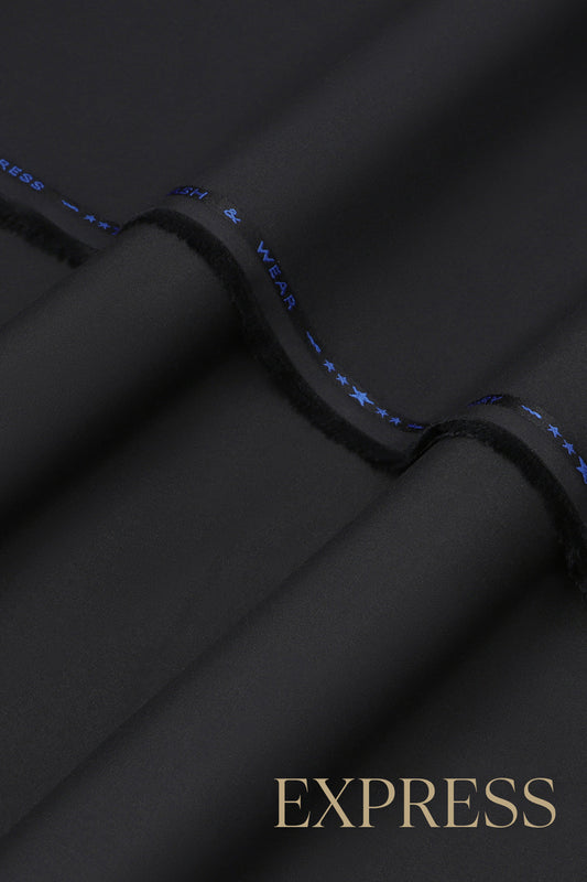 Close-up of smooth suit fabric with branded trim