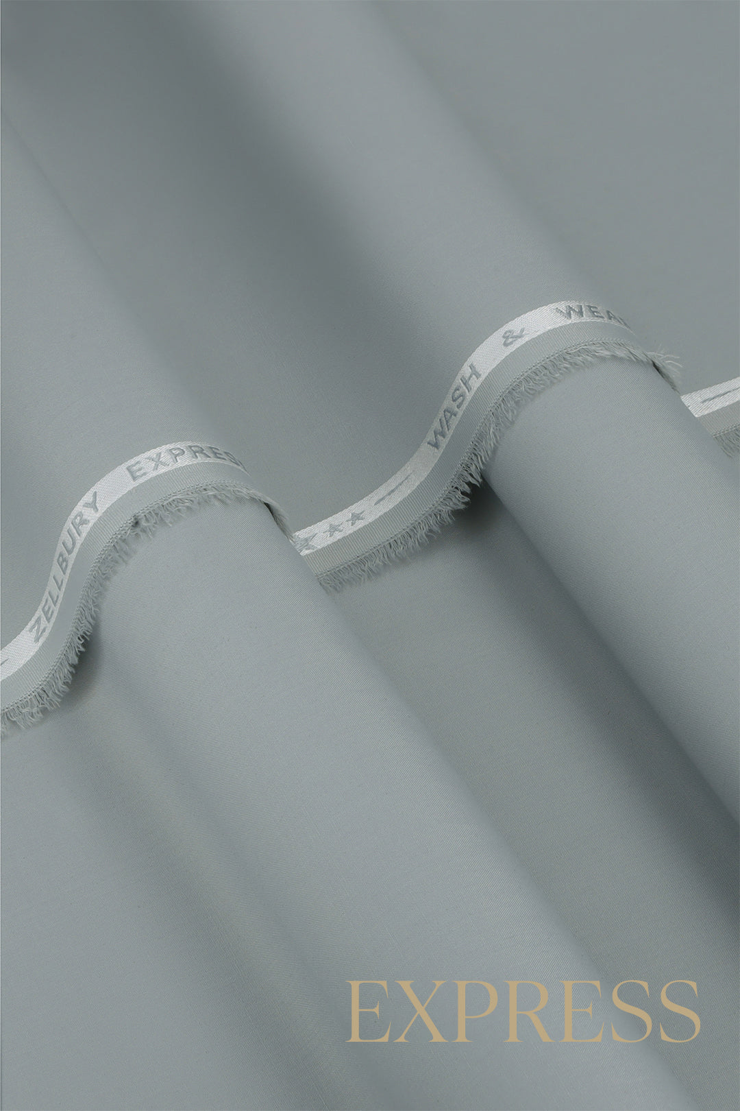 Close-up of smooth suit fabric with branded trim