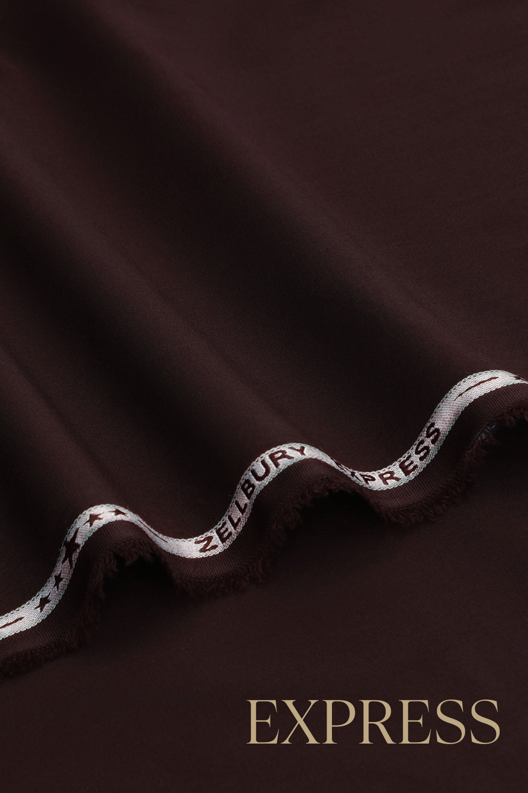 Close-up of smooth suit fabric with branded trim