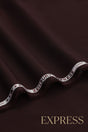 Close-up of smooth suit fabric with branded trim