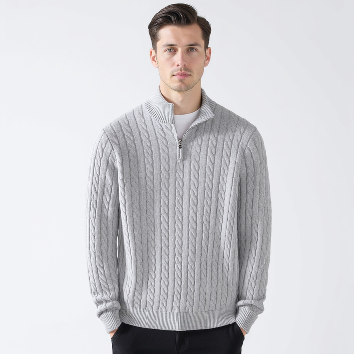 Cable knit sweater with mock collar, quarter zip and ribbed trims