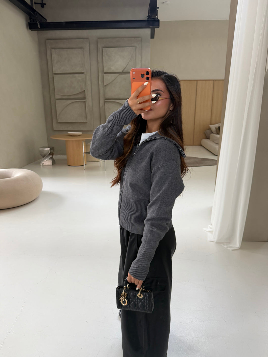 Women's gray hooded zip cardigan with long sleeves and ribbed trim