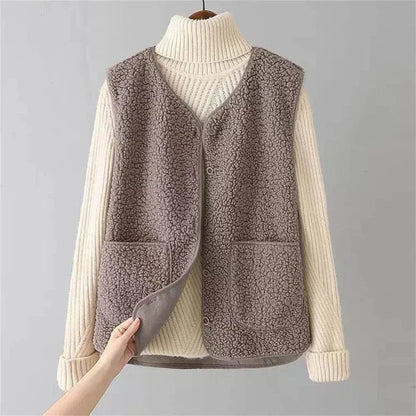 Women's textured sleeveless button vest with patch pockets