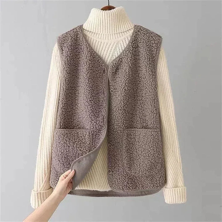 Women's textured sleeveless button vest with patch pockets