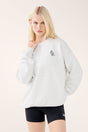 Women's white marle crew-neck sweater with chest graphic