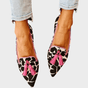 Pointed animal print loafers with tassel trim
