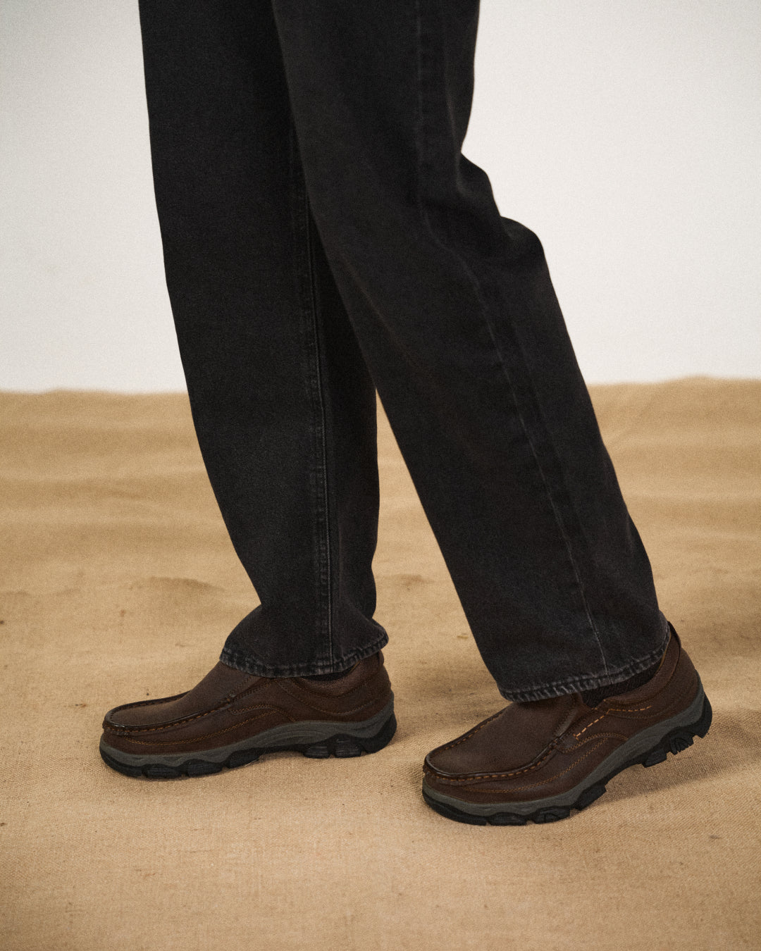Men's casual moc toe loafers with stitched detailing and textured soles