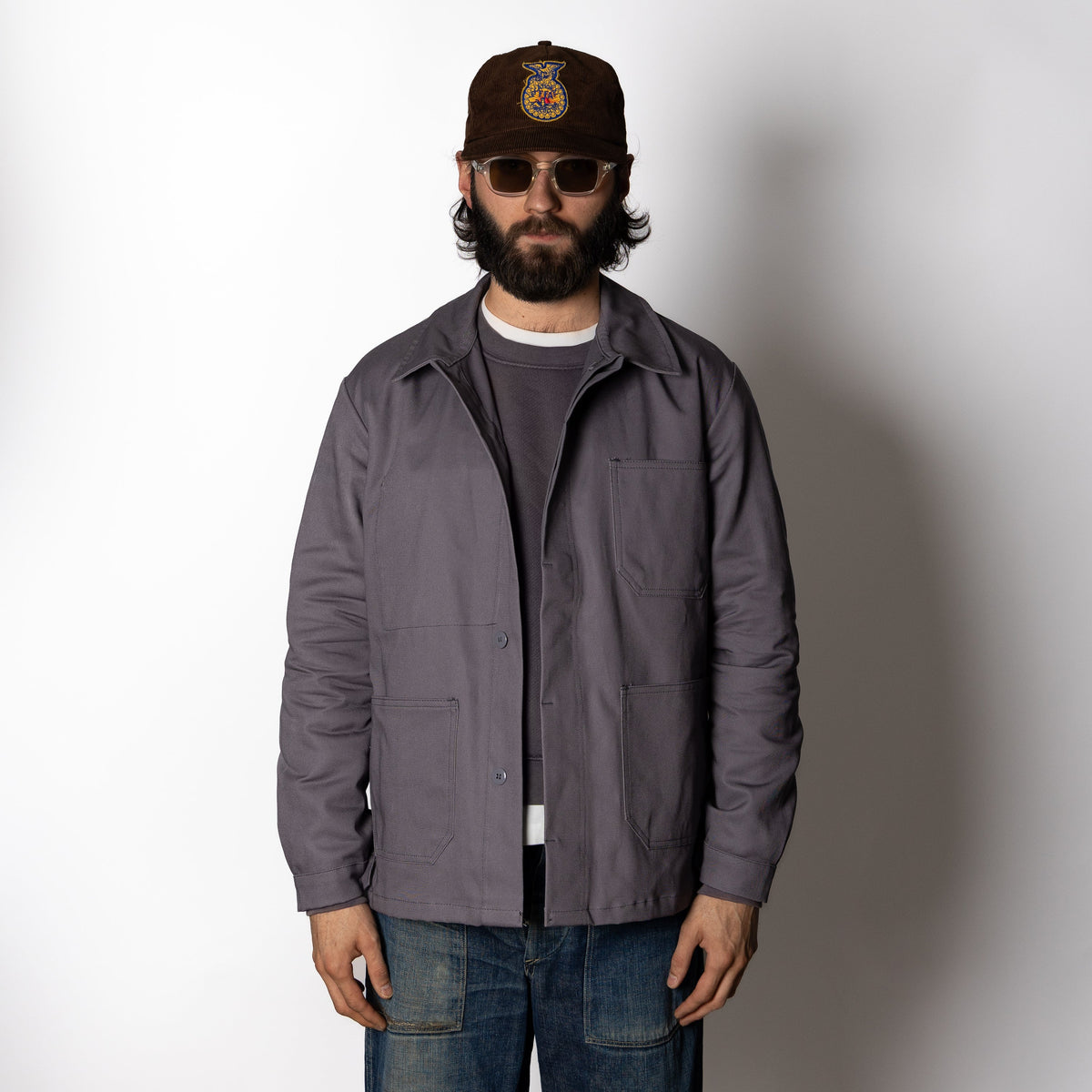 Men's gray utility jacket with pointed collar, long sleeves and four patch pockets