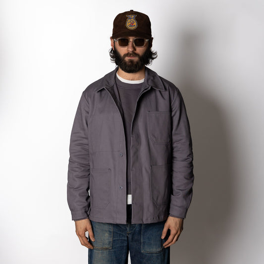 Men's gray utility jacket with pointed collar, long sleeves and four patch pockets