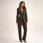 Women's black double breasted blazer suit set with tailored trousers, shown from front and side