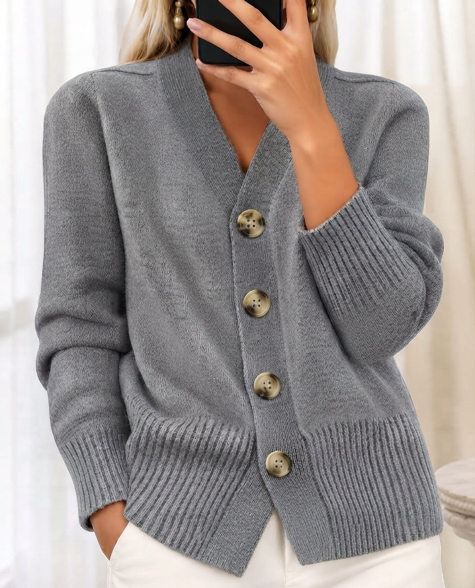 Women's V-neck button cardigan with long sleeves, front pockets and ribbed trims
