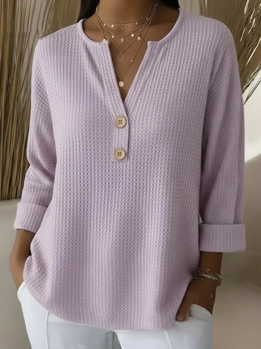 Women's textured waffle henley top with split neckline, buttons and long sleeves