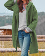 Women's long hooded button-front coat with textured finish