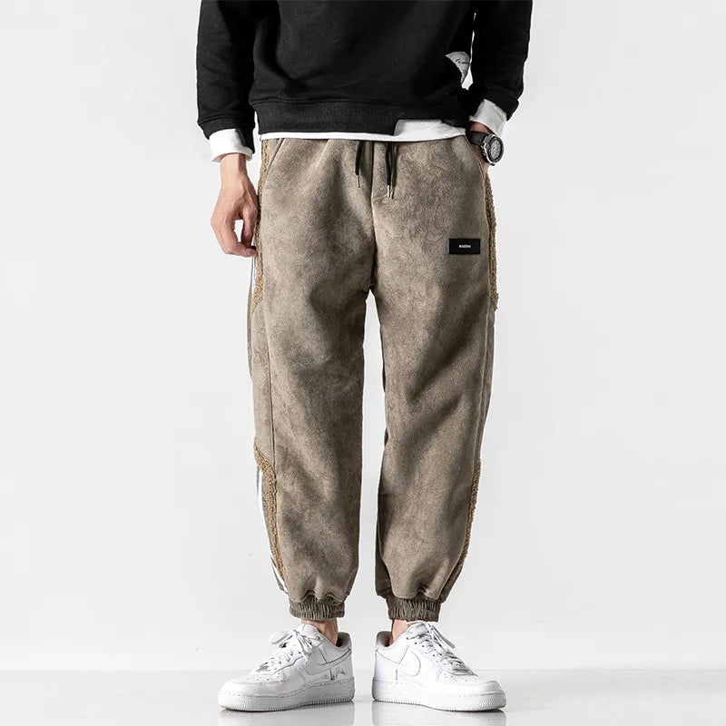 Men's tapered striped jogger pants with drawstring waist and cuffed ankles
