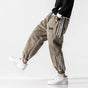 Men's tapered striped jogger pants with drawstring waist and cuffed ankles