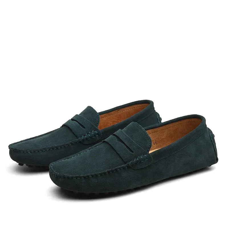 Men's slip-on loafers with moc toe stitching and penny strap detail