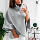 Women's asymmetric turtleneck poncho sweater