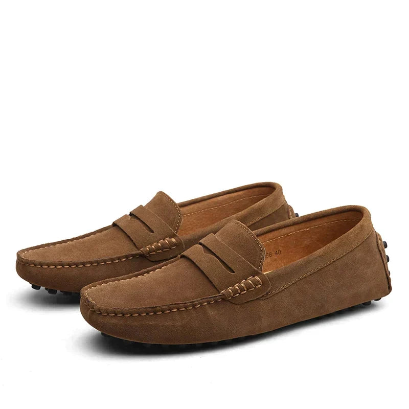 Men's slip-on loafers with moc toe stitching and penny strap detail