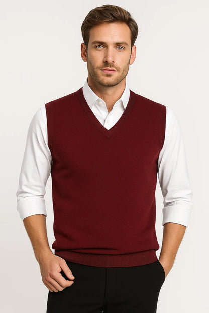 Men's sleeveless V-neck sweater vest with ribbed trims layered over a white shirt