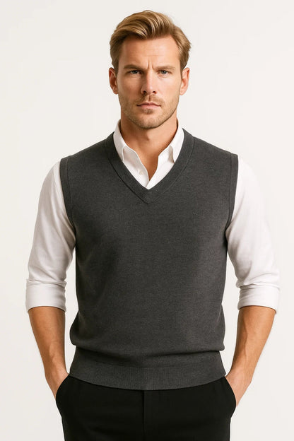 Men's sleeveless V-neck sweater vest with ribbed trims layered over a white shirt