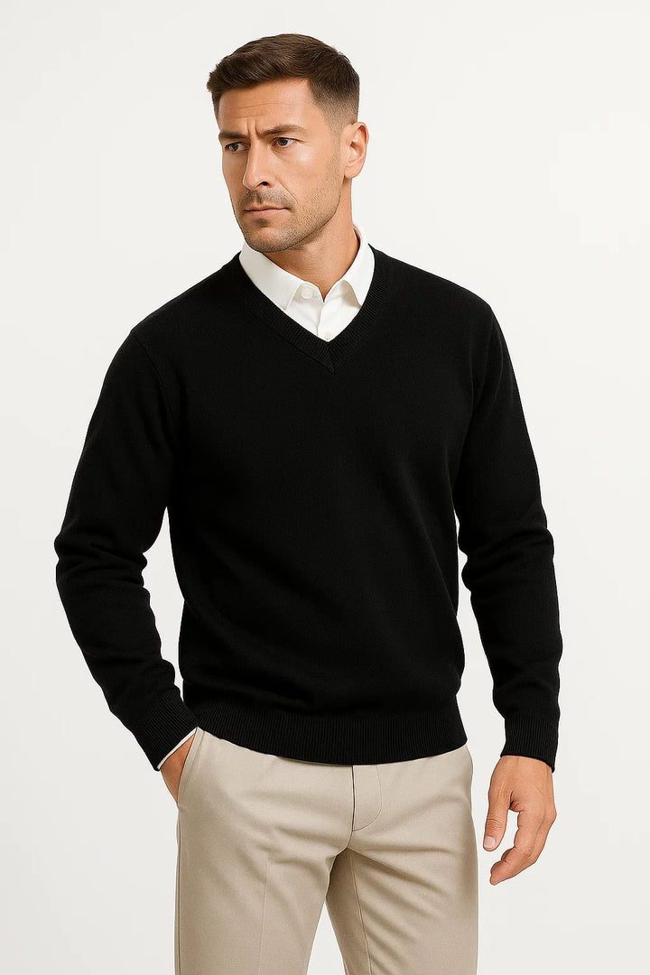 Men's plain V-neck sweater layered over a collared shirt