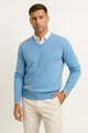 Men's plain V-neck sweater layered over a collared shirt