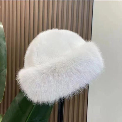 Women's winter hat with a rounded brim and fuzzy finish