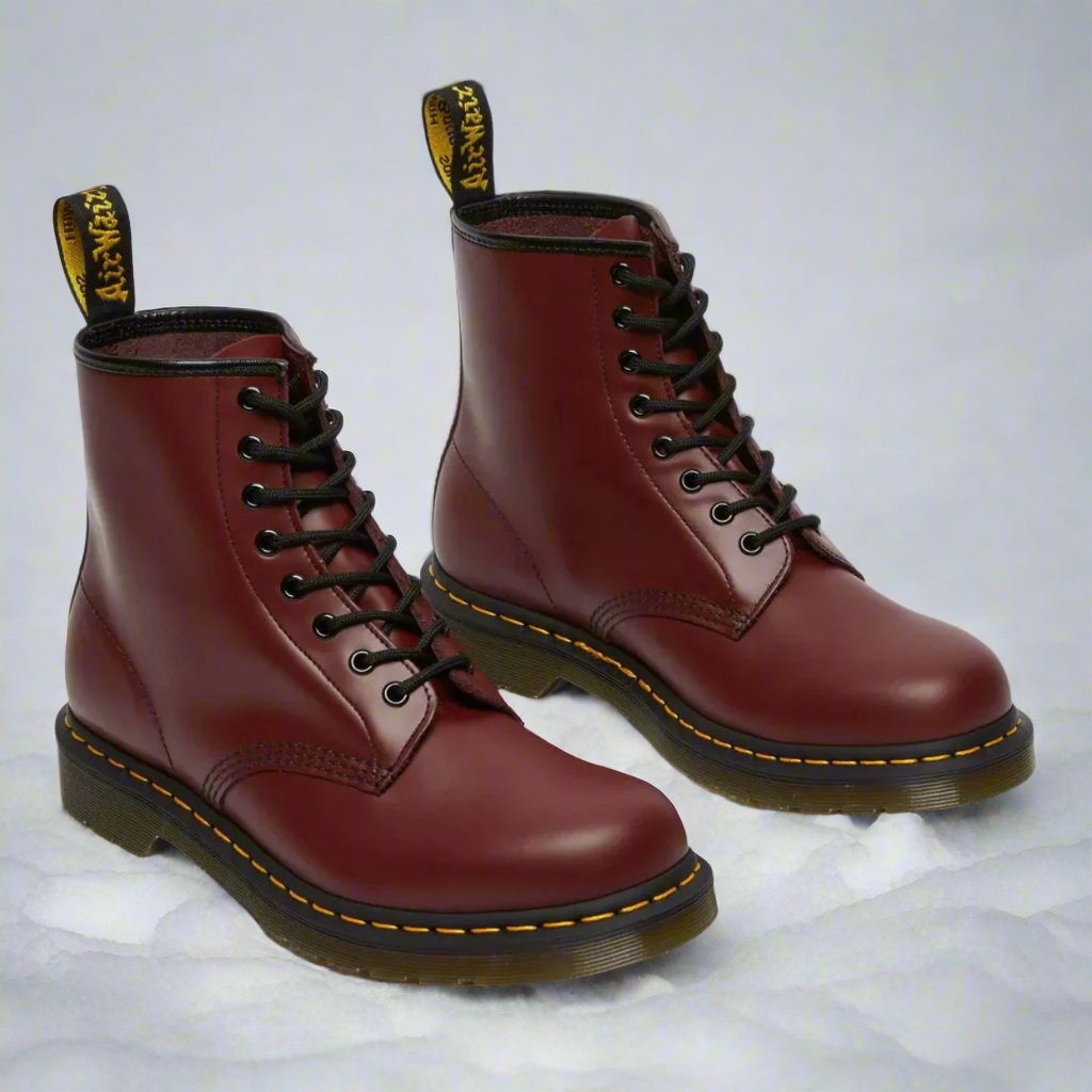 Men's lace-up combat boots with round toes, ankle shafts and ridged soles