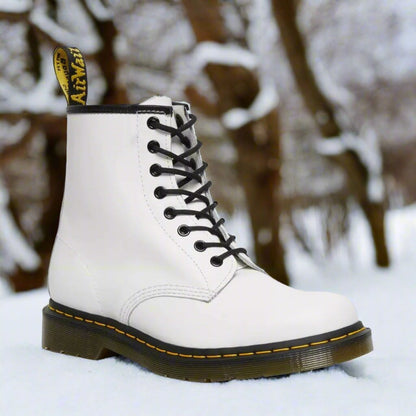 Men's lace-up combat boots with round toes, ankle shafts and ridged soles