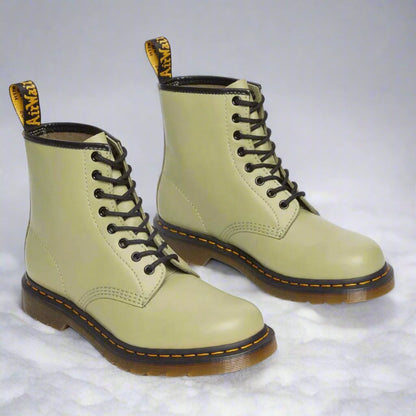 Men's lace-up combat boots with round toes, ankle shafts and ridged soles