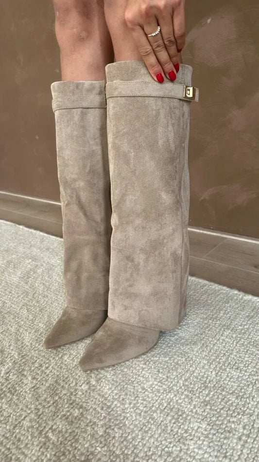 Women's knee-high pointed toe boots with high heel and buckle detail