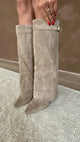 Women's knee-high pointed toe boots with high heel and buckle detail