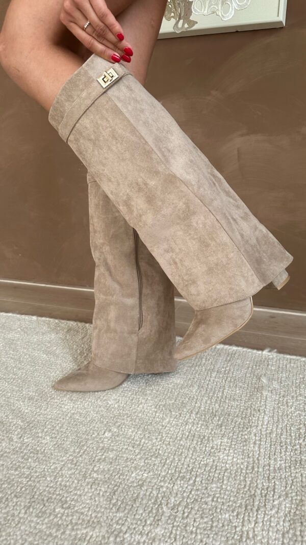 Women's knee-high pointed toe boots with high heel and buckle detail