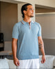 Men's ribbed knit polo shirt with short sleeves and button placket
