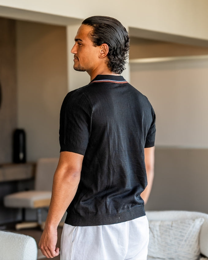 Men's ribbed knit polo shirt with short sleeves and button placket