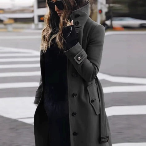 Women's knee-length button-front coat with stand collar and flap pockets