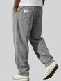 Men's wide leg ribbed corduroy pants with elastic waist and side pockets