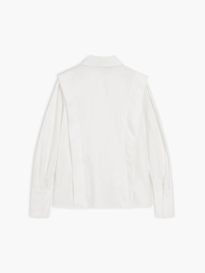 Women's white button-up shirt with wide cuffs and pointed collar, long sleeves